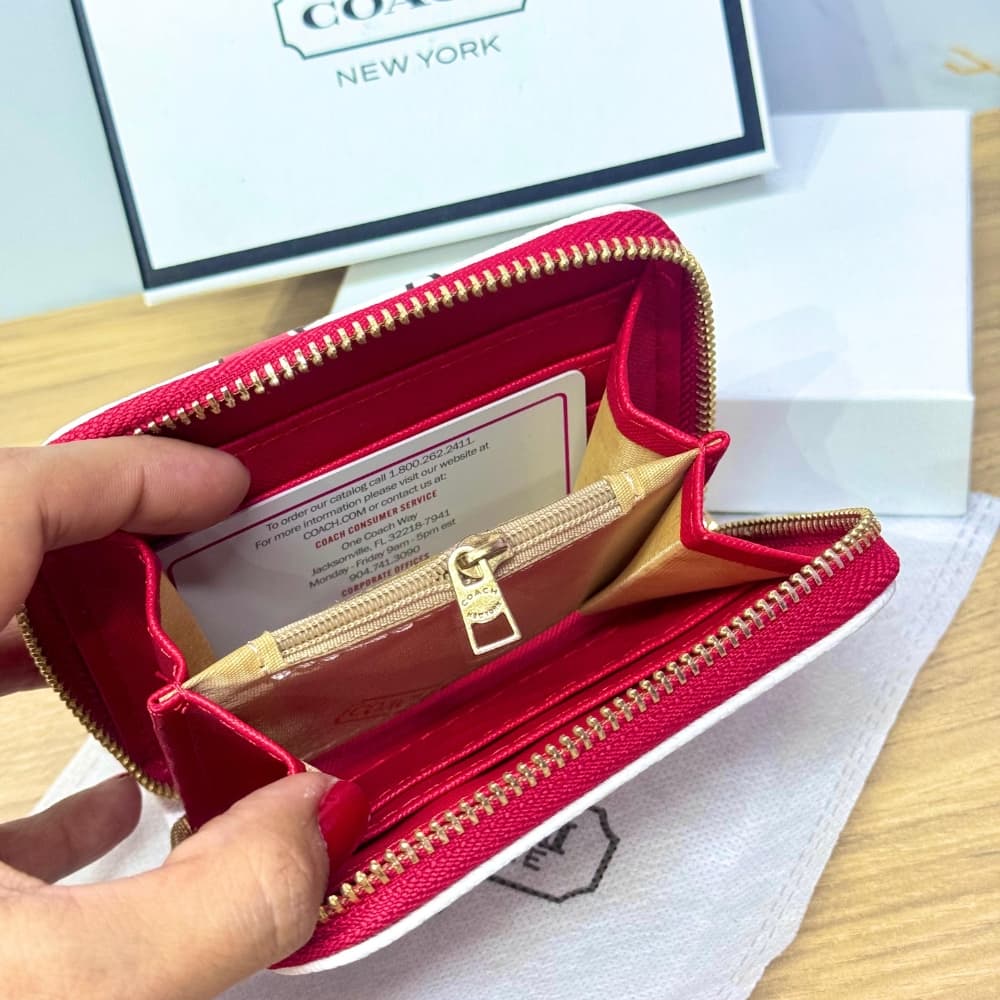 Cartera Coach Snap con estampado de cereza y corazón