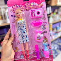 Muñeca con accesorios